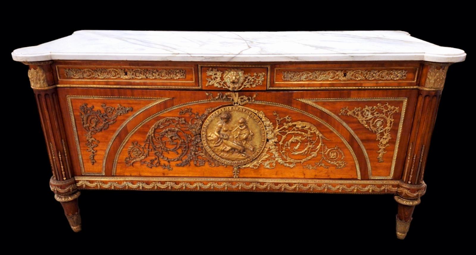 A French LouisXVI style commode.