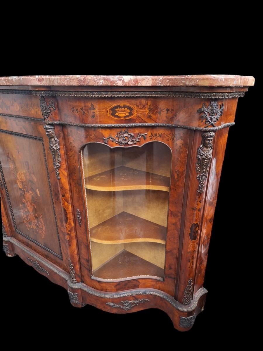 A Louis XV  style marble topped sideboard.