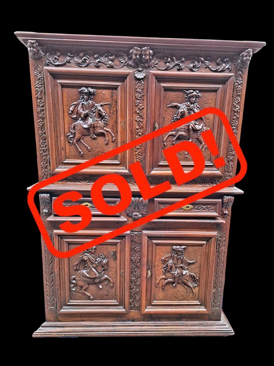 A very nice carved 4-doors walnut cabinet