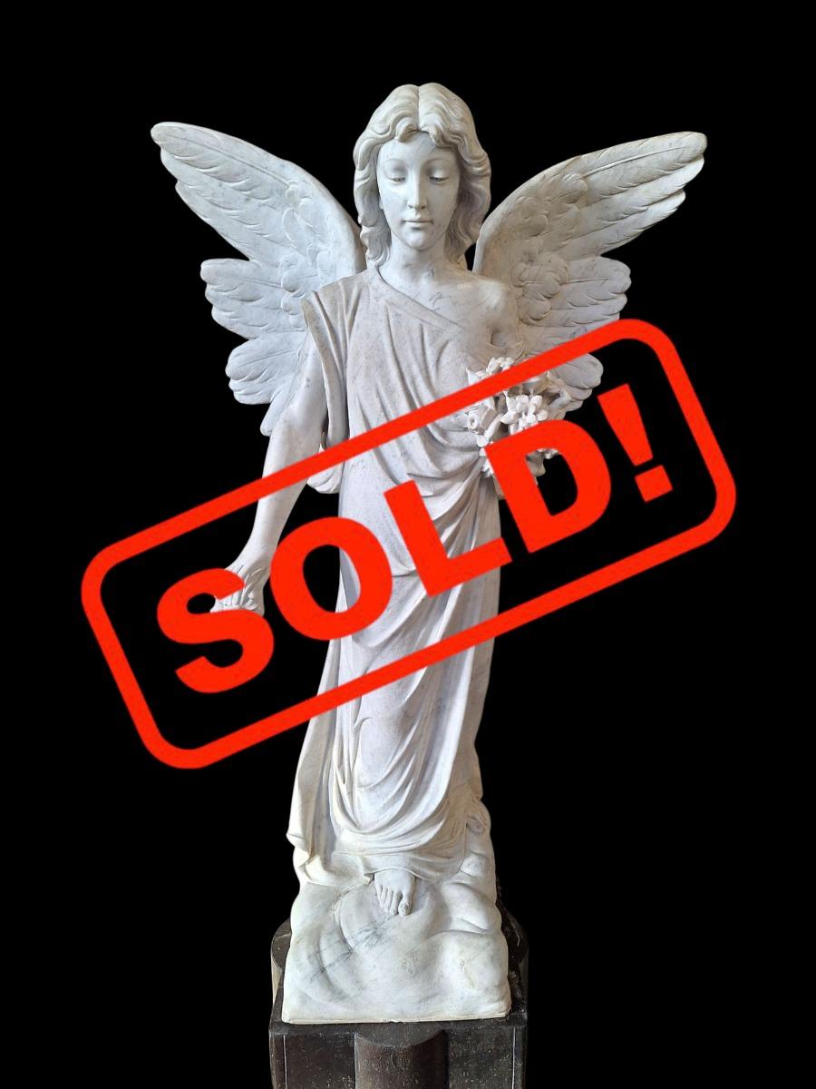 A white marble angel.
