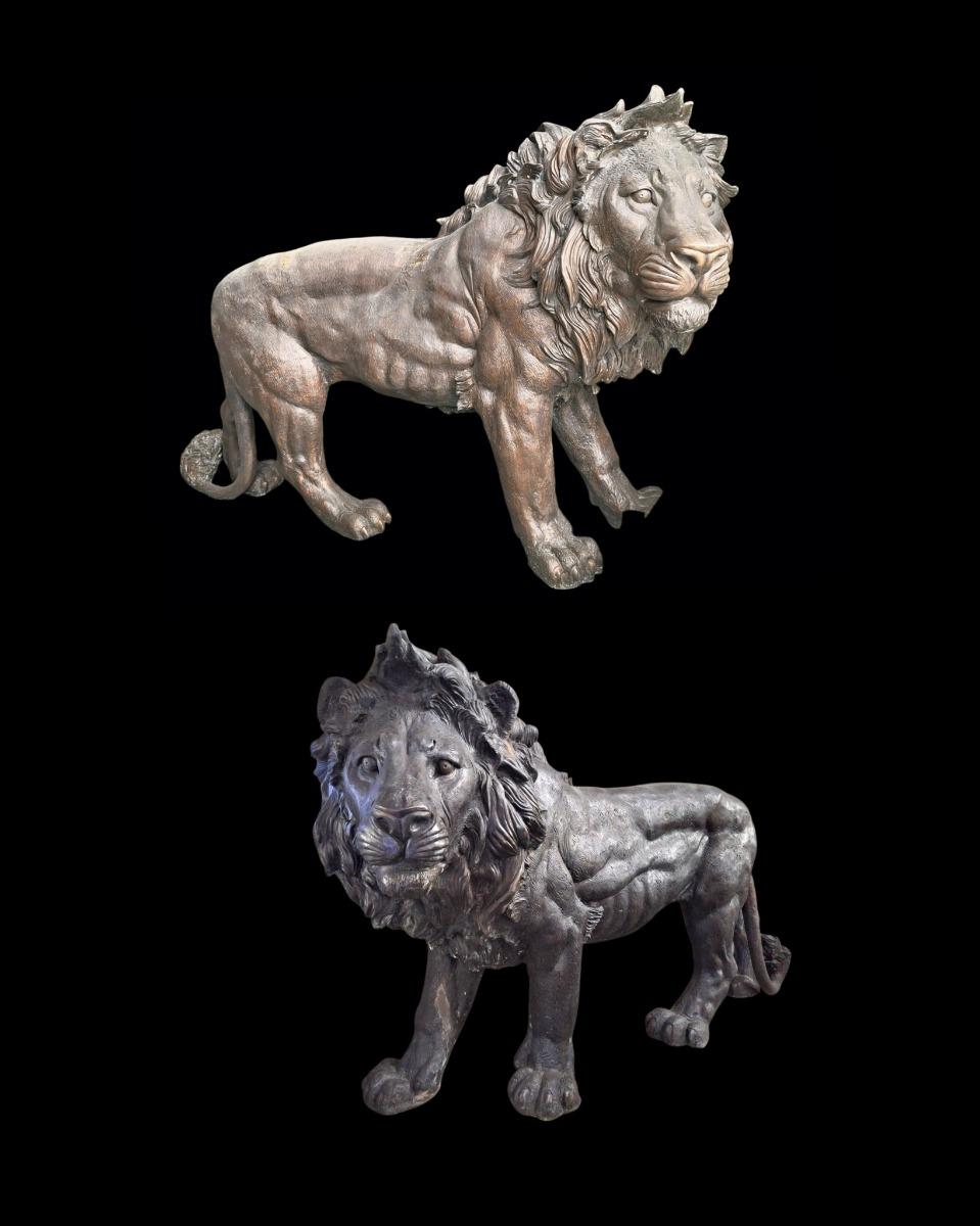 A pair of very large bronze lions