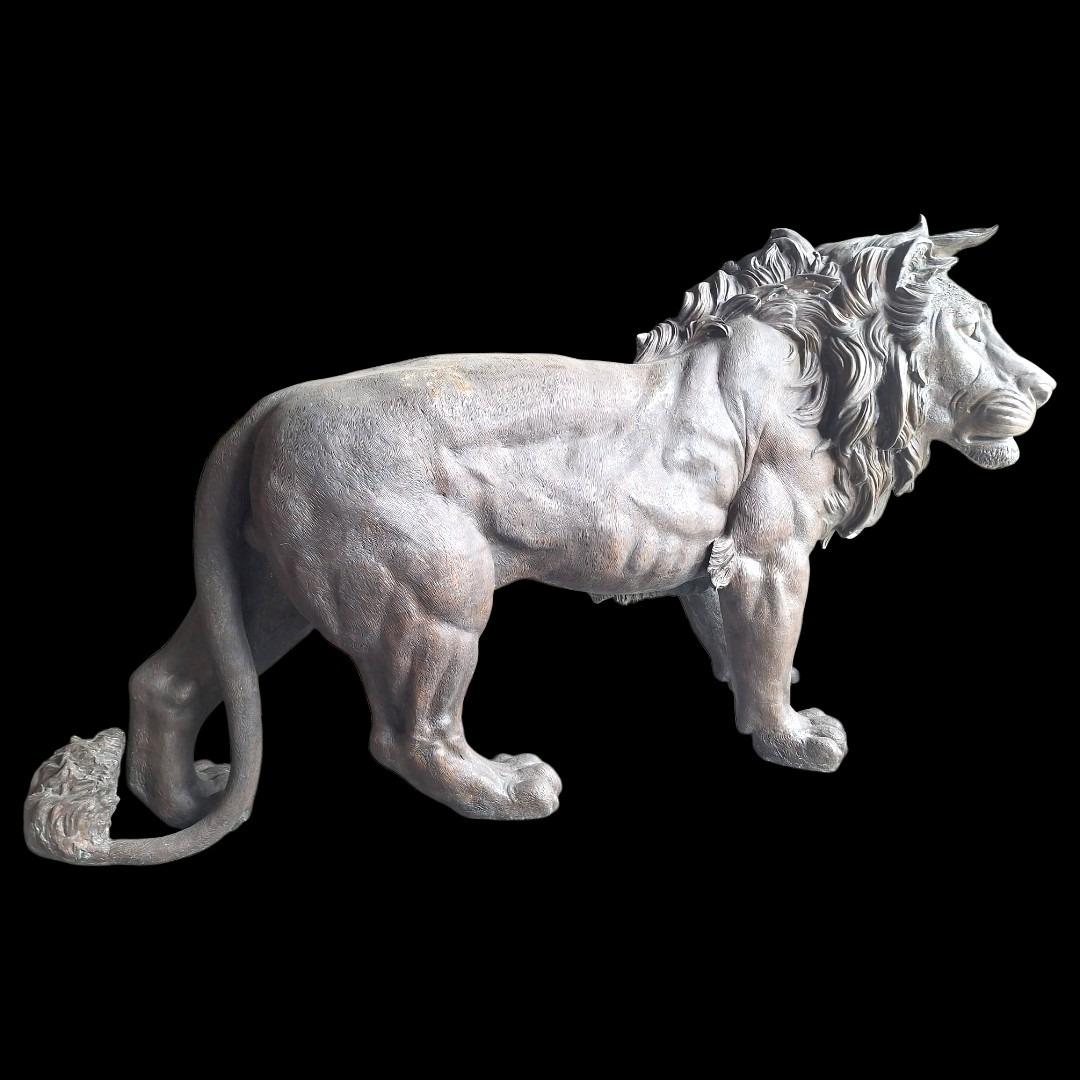 A pair of very large bronze lions