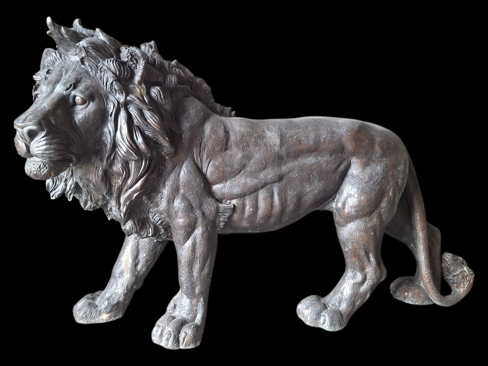 A pair of very large bronze lions