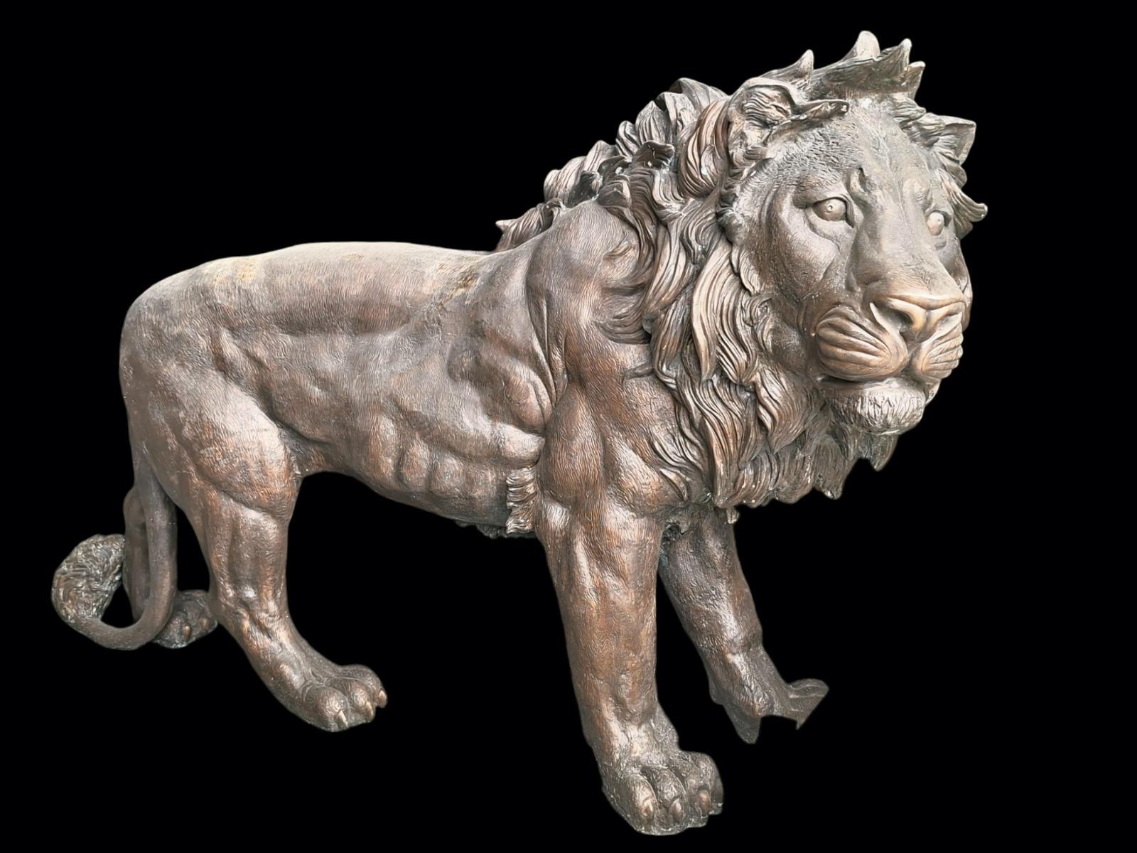 A pair of very large bronze lions