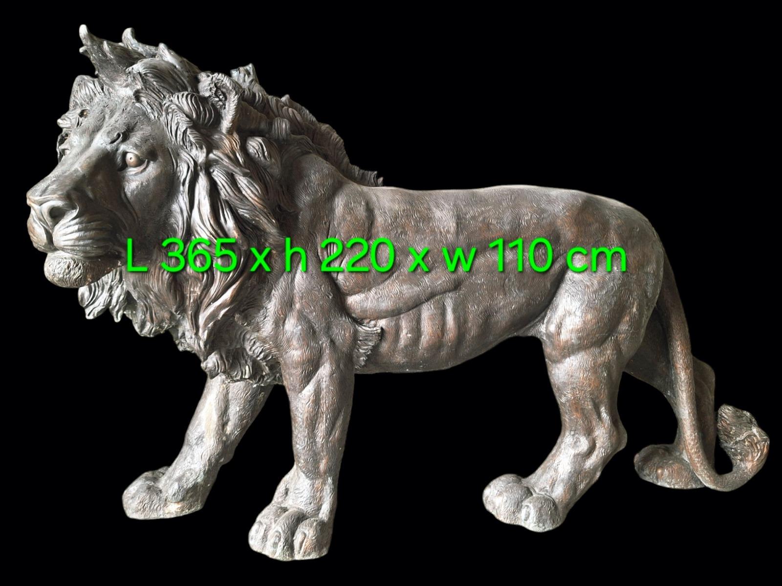 A pair of very large bronze lions