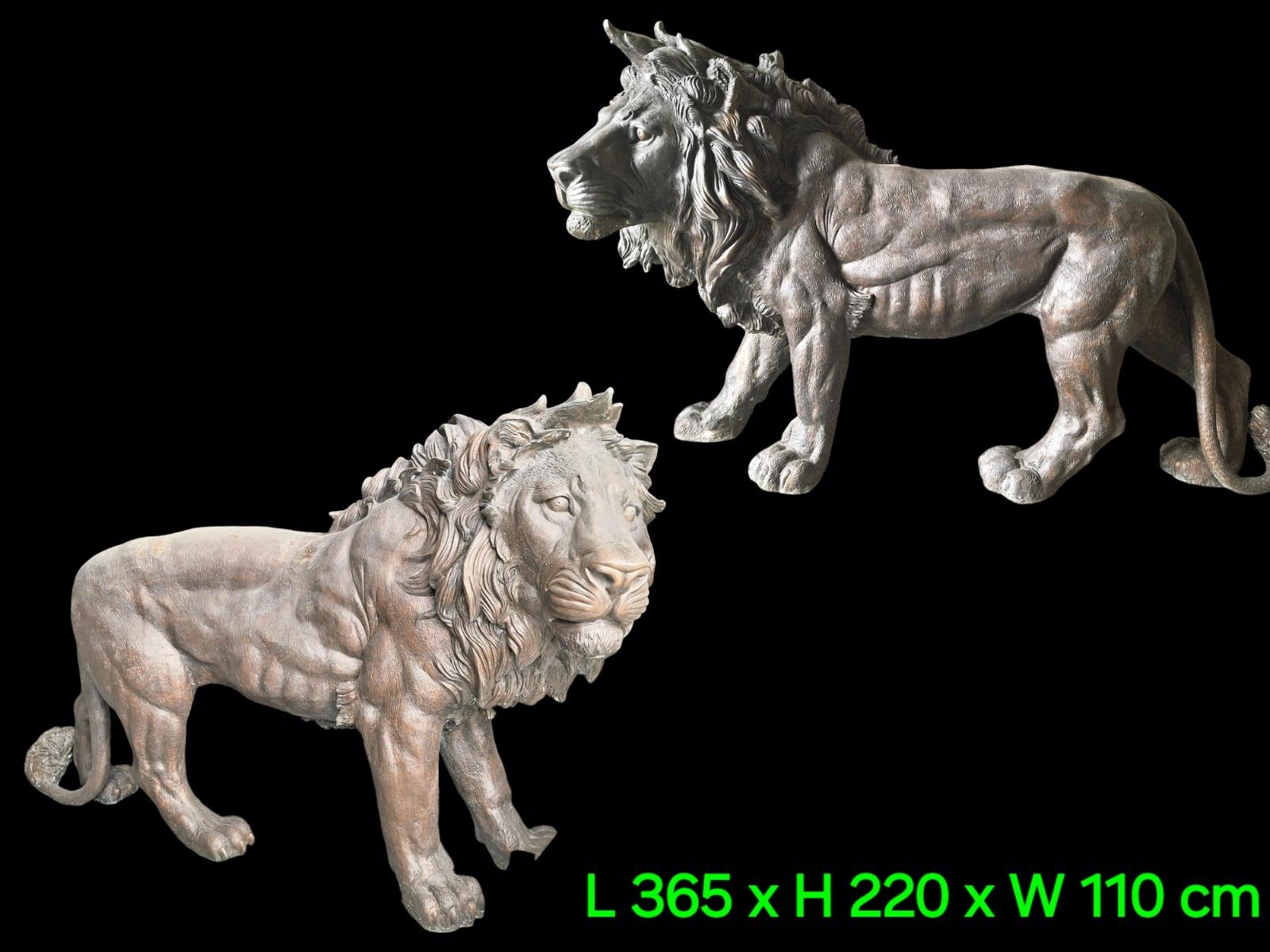 A pair of very large bronze lions