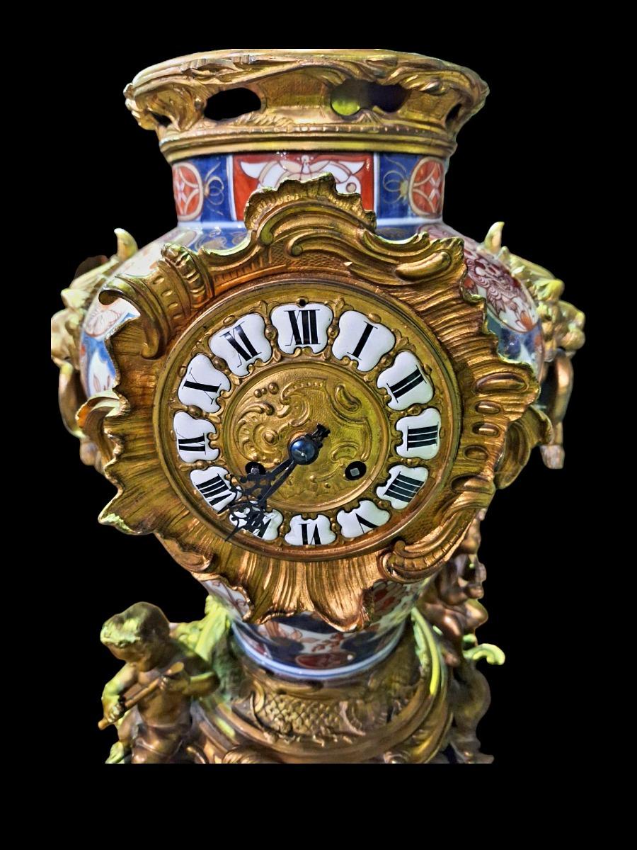 Bronze and porcelain clock set
