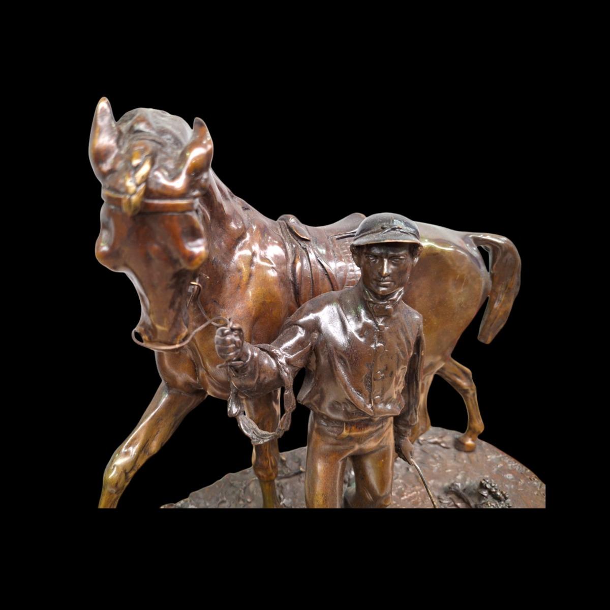 Bronze horse and jockey signed PJ Mene