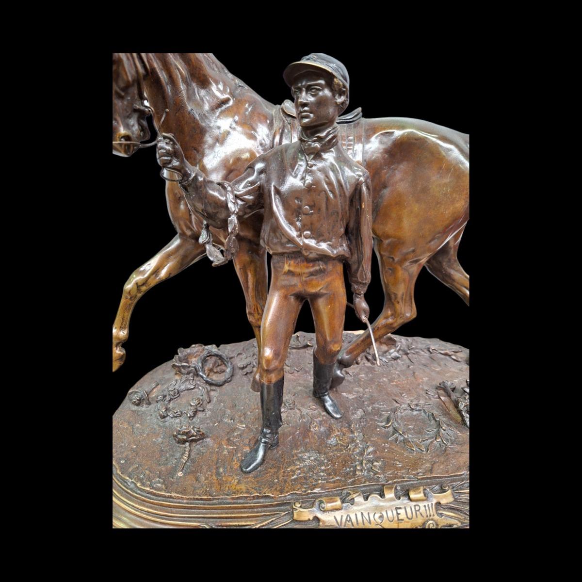 Bronze horse and jockey signed PJ Mene