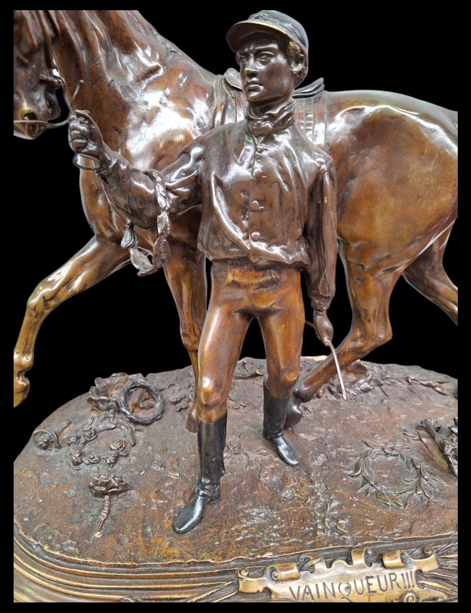 Bronze horse and jockey signed PJ Mene