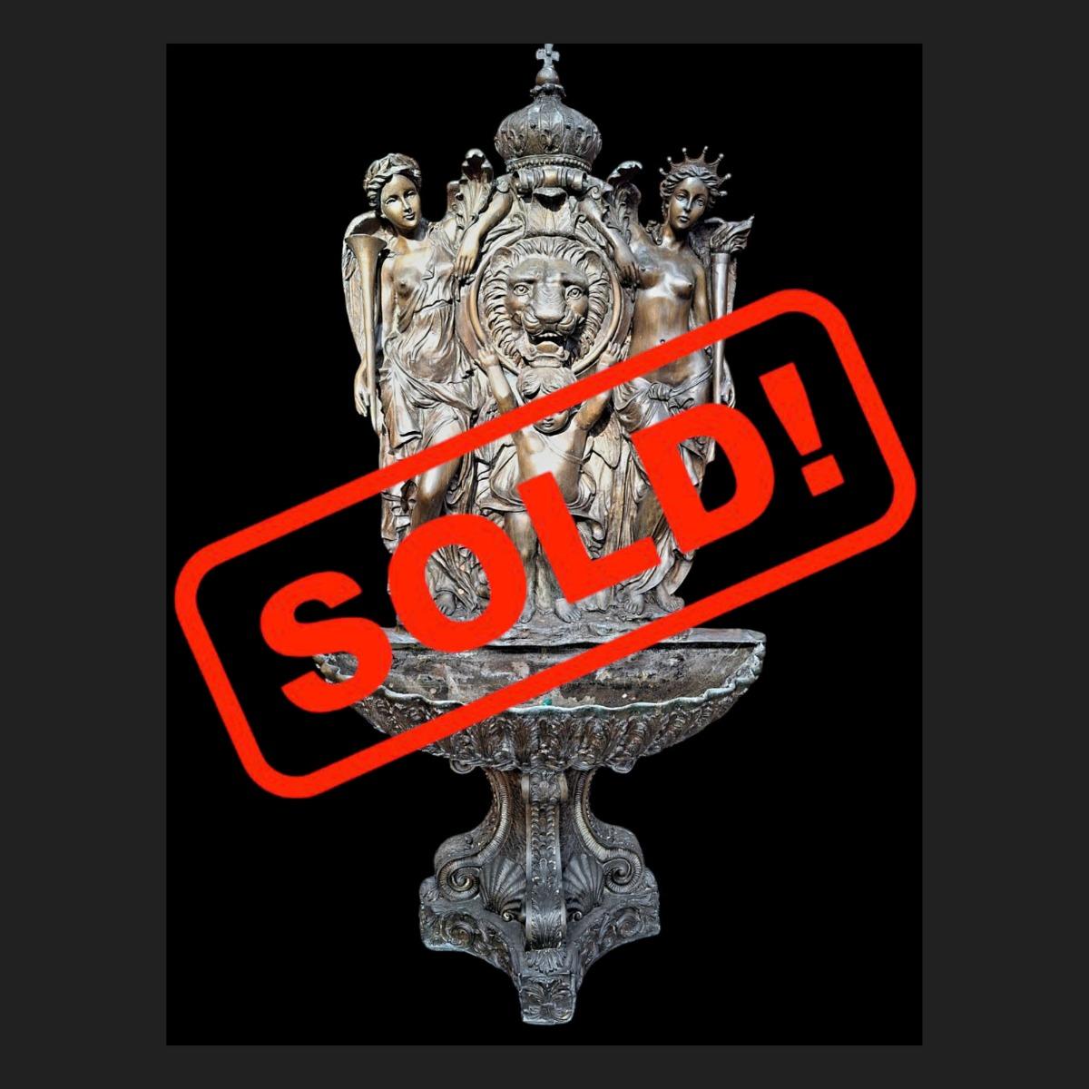 Bronze wall fountain