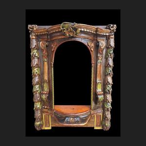 Carved wooden and polychromed niche.