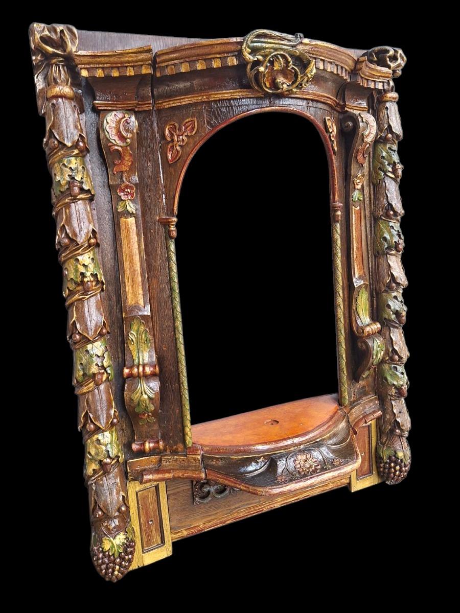 Carved wooden and polychromed niche.