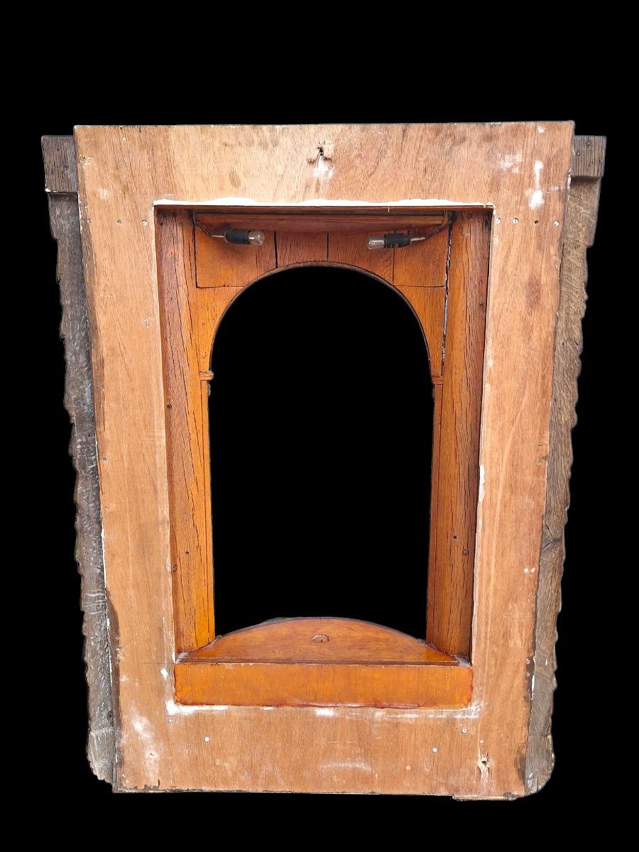 Carved wooden and polychromed niche.