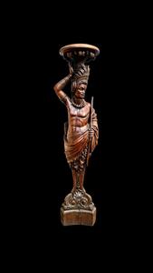 Impressive carved torch representing 
