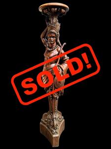 Impressive carved torch representing 