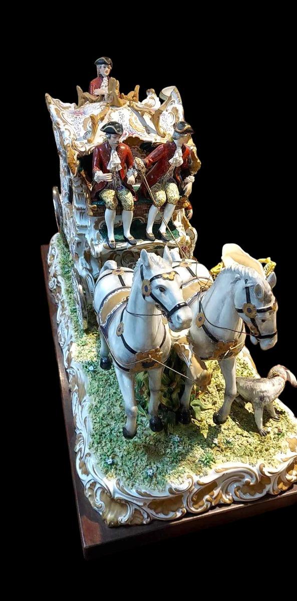 Italian porcelain horse carriage.