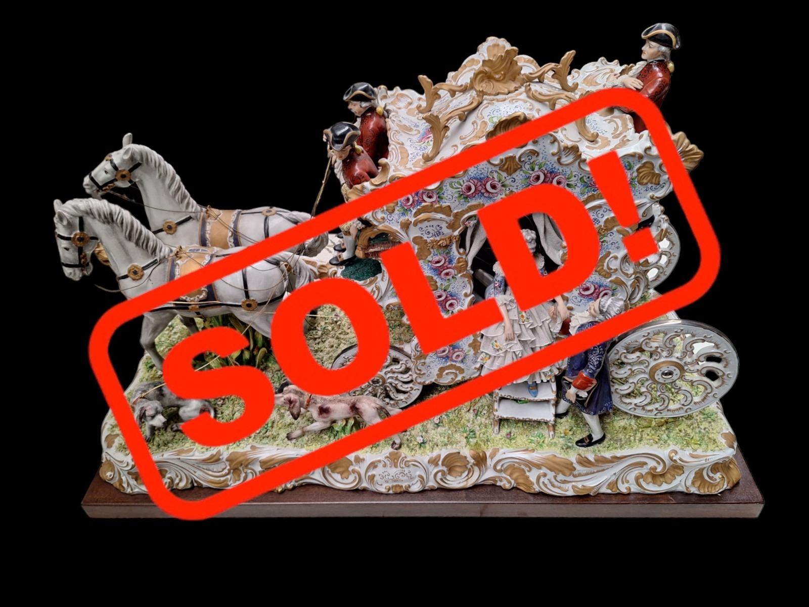 Italian porcelain horse carriage.