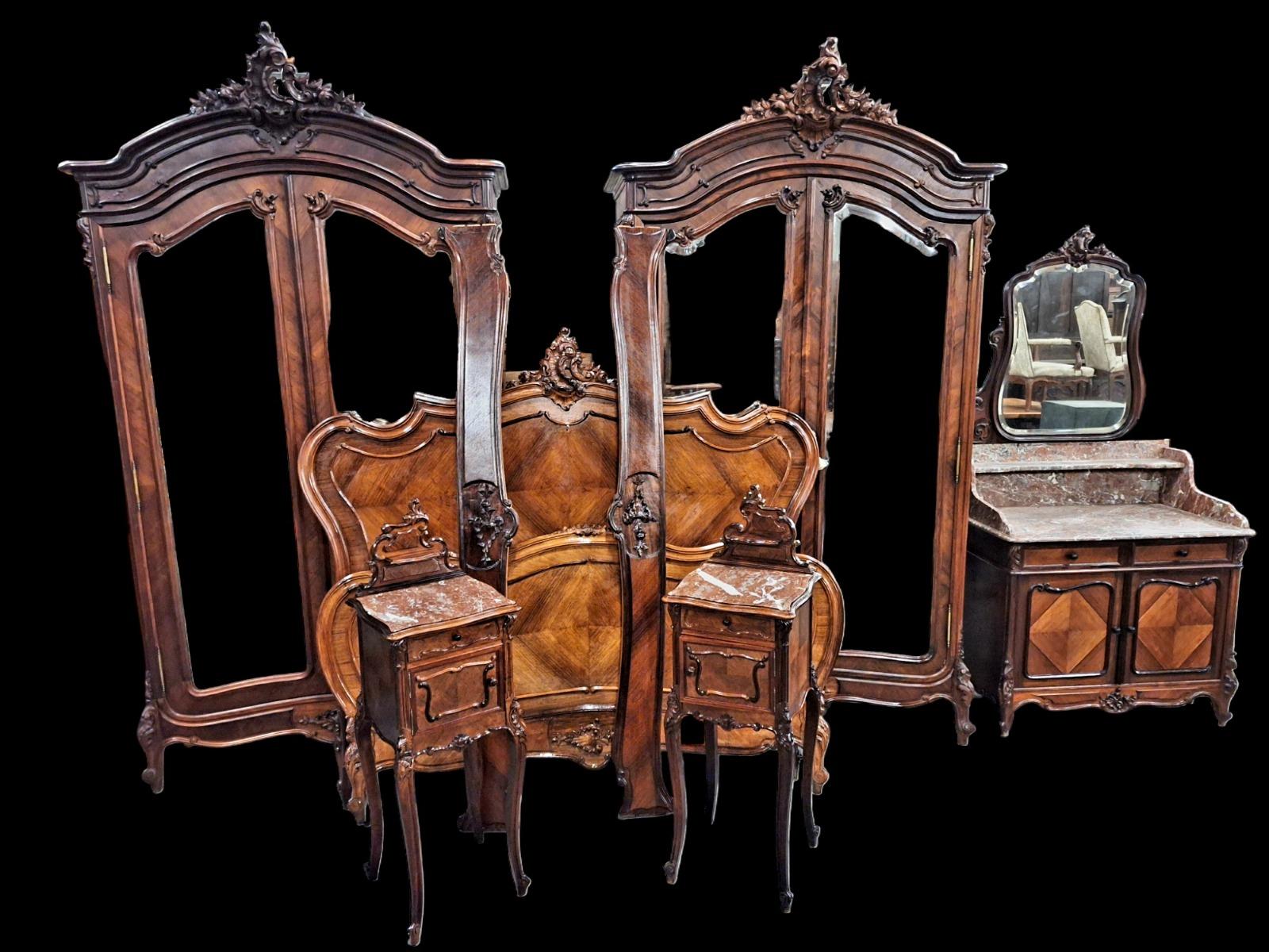 Louis XV style bedroomsuite in marquetry and walnut.