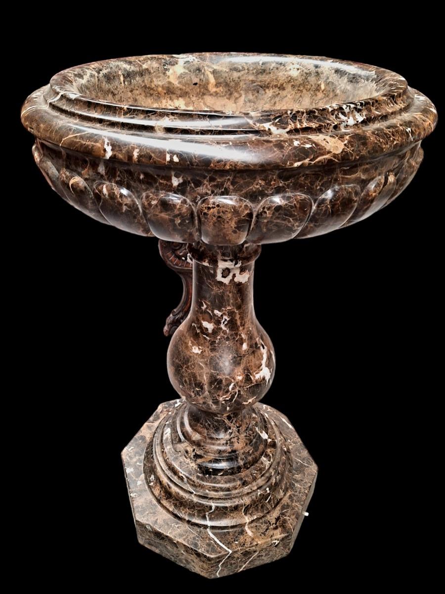 Marble baptismal font.