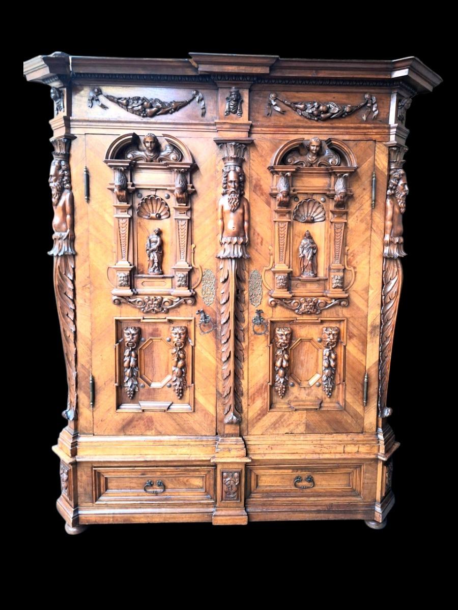 Richely carved walnut wardrobe