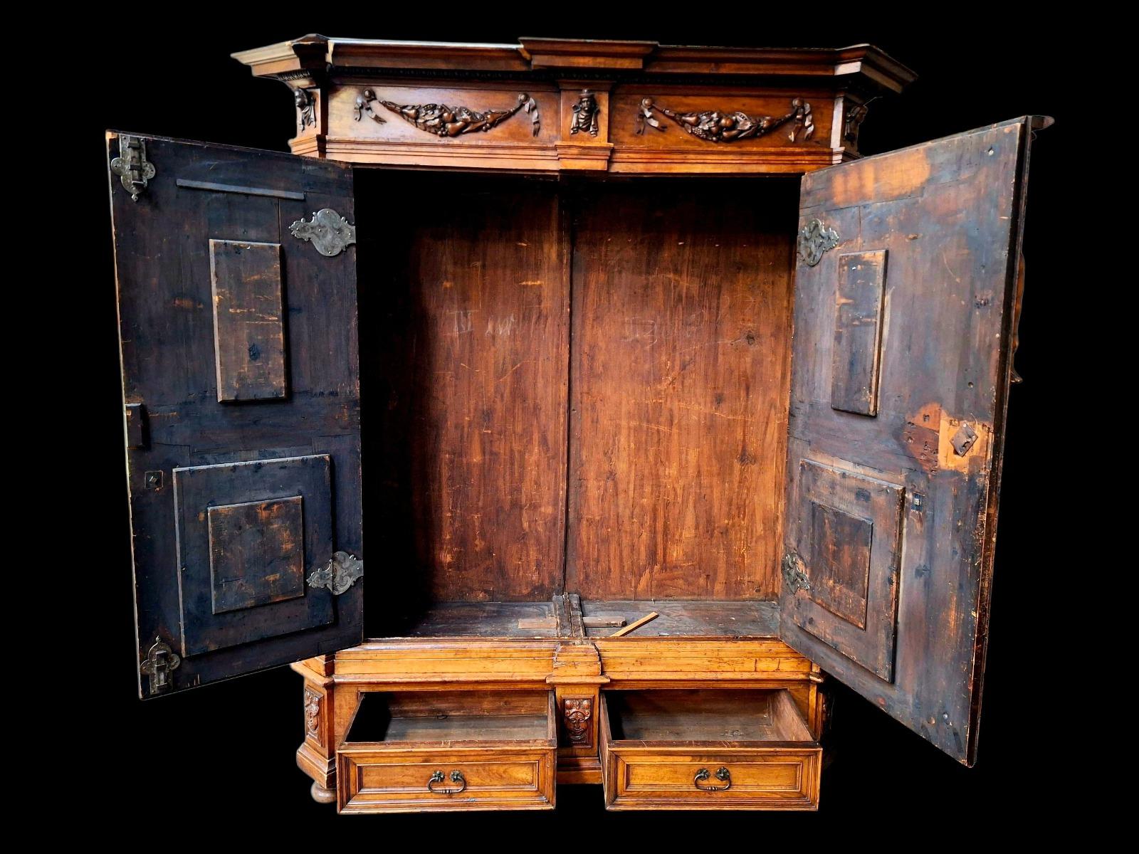 Richely carved walnut wardrobe