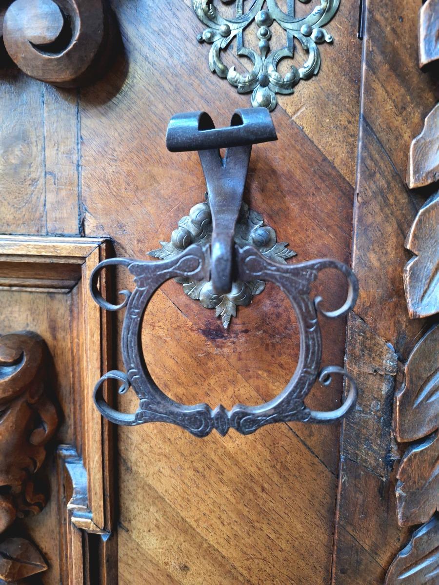 Richely carved walnut wardrobe