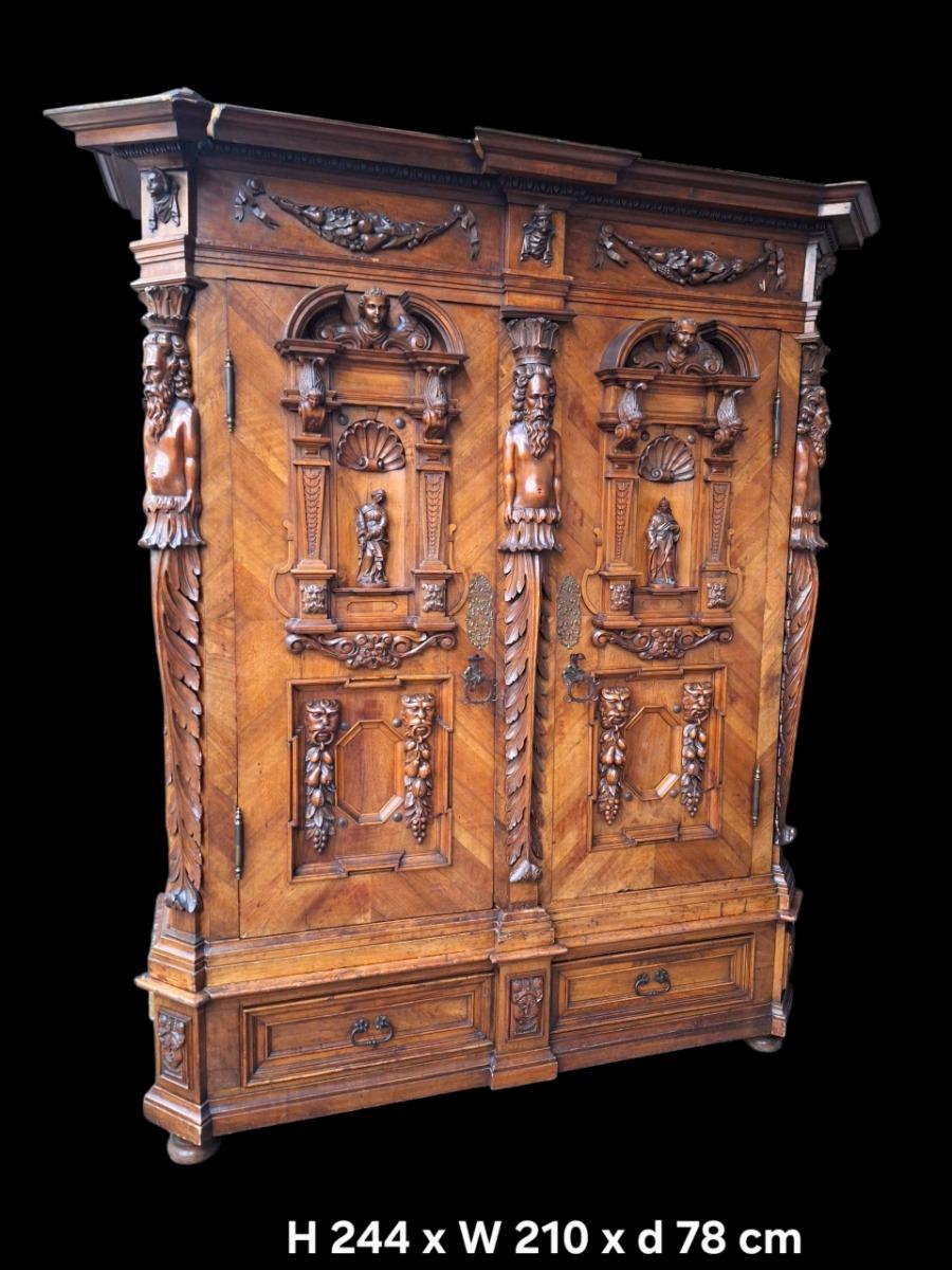 Richely carved walnut wardrobe
