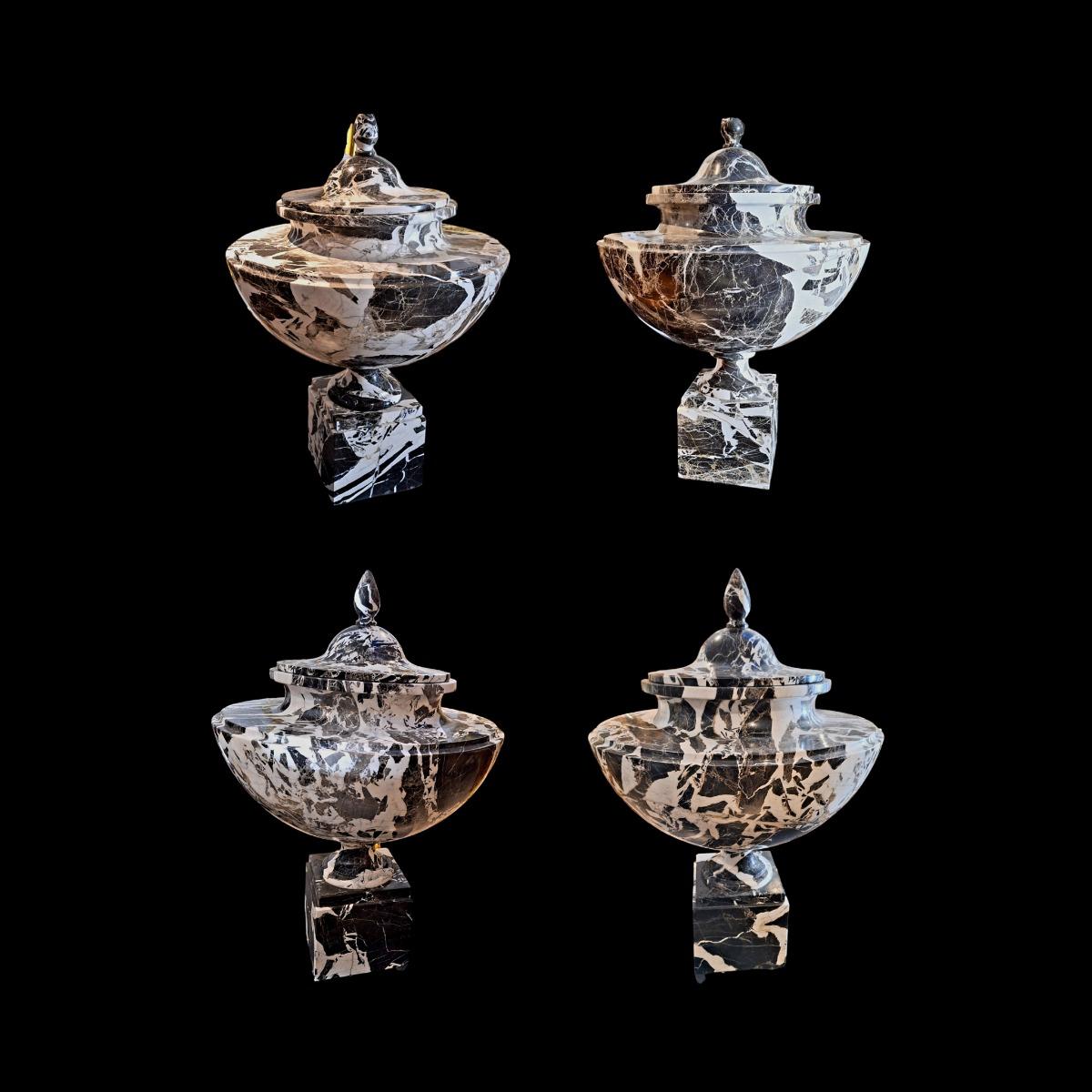 Set of 4 urns.