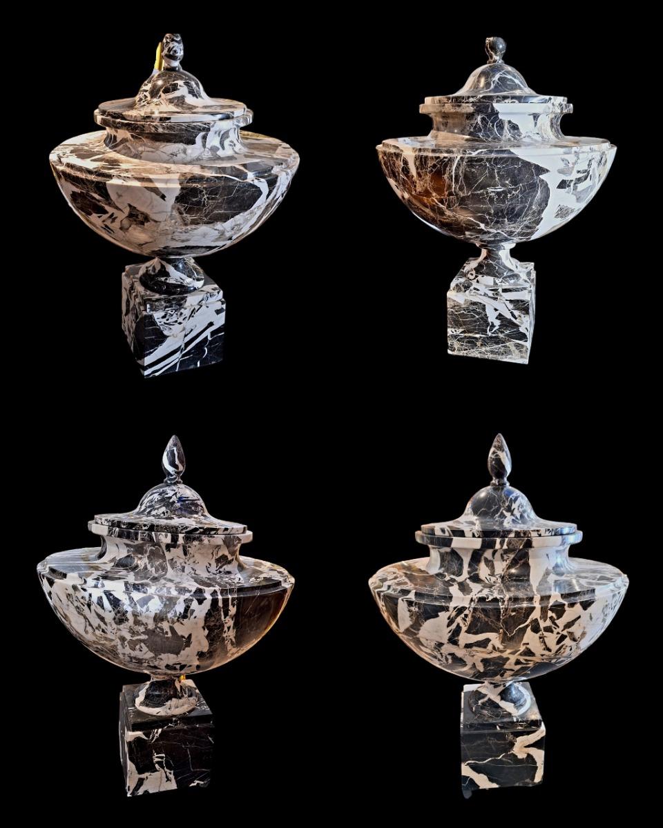 Set of 4 urns.