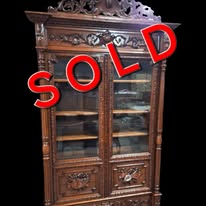 Well carved solid oak Bookcase in Hunting style.  4 shelves and 1 drawer. 